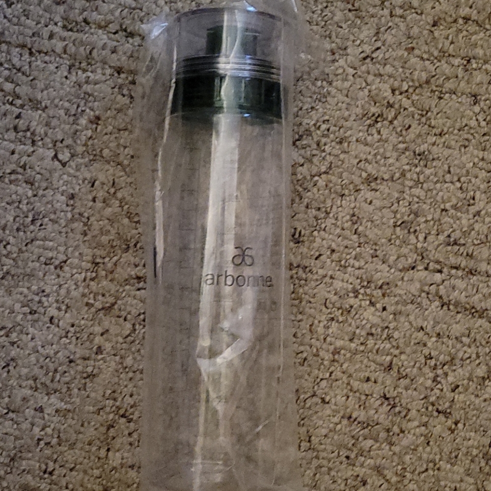 New in plastic arbonne water bottle!